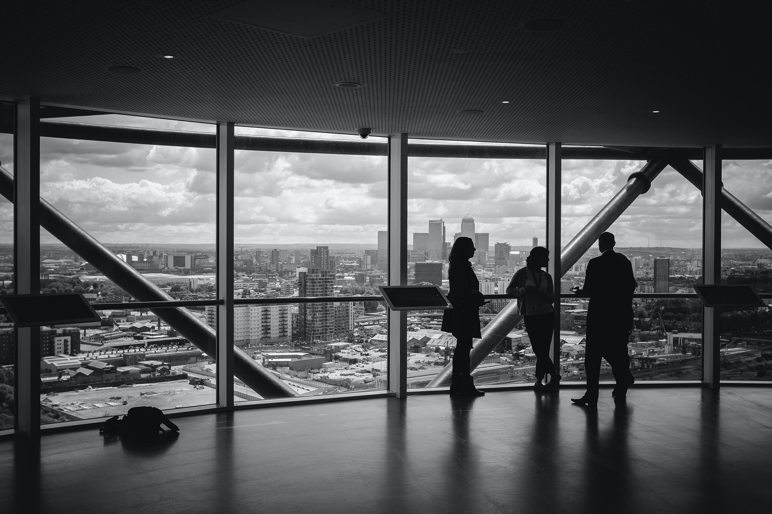 People talking in high-rise office building